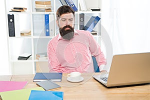 Salary man. Bearded man sit at work desk. Working in modern office. Workplace environment. Business worker. Job and