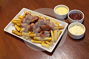 Salchipapas, typical Peruvian food. photo