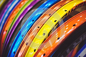 Sale beautiful colored bicycle rim stand in a row of different colors