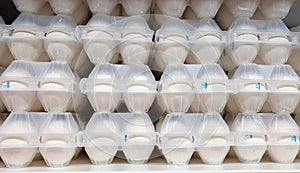 Sale of chicken eggs in plastic containers