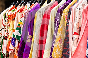 Sale of colorful kimonos on the city street in Kyoto, Japan. Close-up.