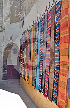 Sale of handmade textiles in the streets of Morocco