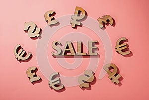 Sale icon surrounded by world currency signs