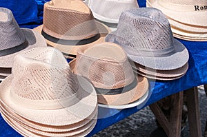 sale of men`s hats at the market in Heihe in the summer