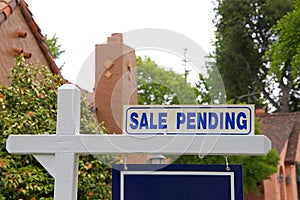 Sale pending sign on residential home