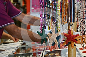 sale of plastic colored jewellery at the market