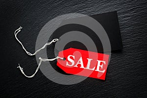 Sale price tags on dark background