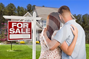 For Sale Real Estate Sign, Military Couple Looking at House