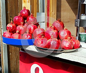 Sale of red pomegranates on the streets of Georgia