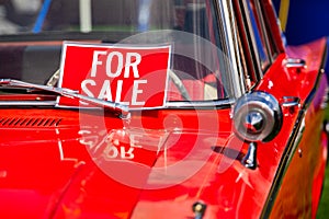 FOR SALE red sign on classic antique car