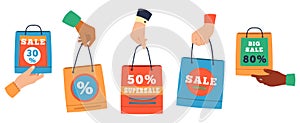 Sale shopping bags. Hands holding paper shoppers with discount percentage, purchase bags. Promote sales or gifts bags