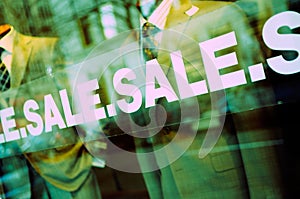 Sale sign on glass window