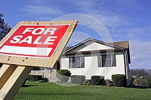 For Sale Sign House and Green Grass