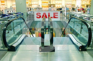 'SALE' sign in a shopping mall