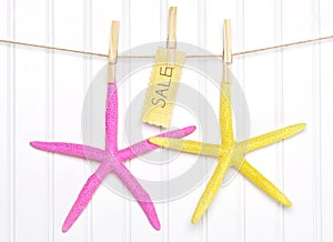 Sale Starfish with Sign on Clothesline