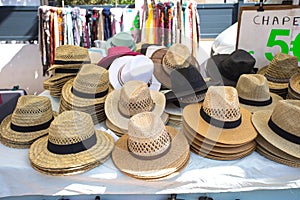 Sale of sun hats in a market