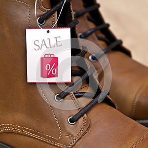 Sale Price Tag on Leather Boots