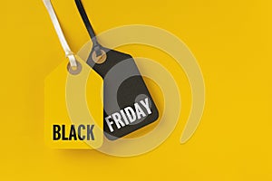 Sale tags with Black Friday written on yellow background
