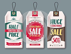 Sale tags vector set and labels for Christmas season hanging in white paper