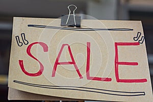 Sale text written in red ink