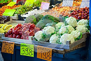 Sale of vegetables and fruit in bowls in market