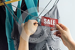 Sale with woman hand