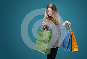 Sale. Young woman with shopping bags