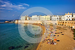 Salento. Apulia Puglia Italy. Gallipoli. People on the beach
