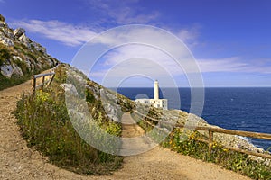 Salento coast: the Palasca lighthouse of Cape of Otranto in Apulia standing on hard granite rocks is the most easterly point of It