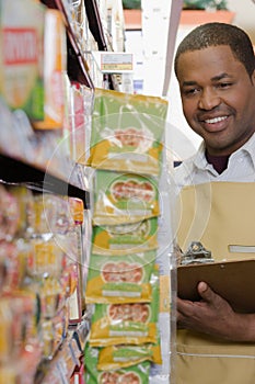 Sales assistant doing a stocktake