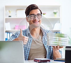 Sales assistant at publishing house showing ready printed books