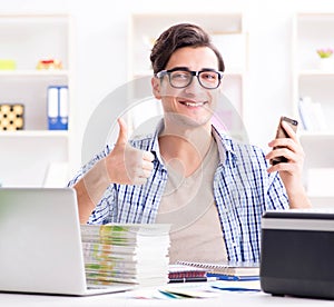 Sales assistant at publishing house showing ready printed books