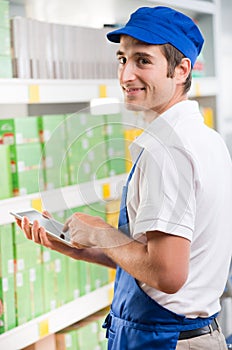 Sales clerk with tablet photo