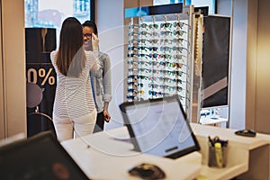 Sales lady assisting a customer in a store