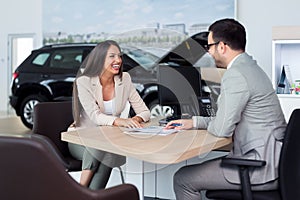 Sales manager at a showroom car is worth to the buyer