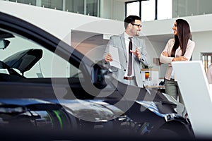 Sales manager at a showroom car is worth to the buyer