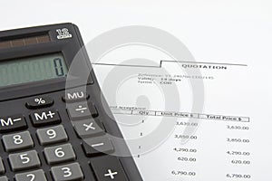 Sales quotation and calculator photo