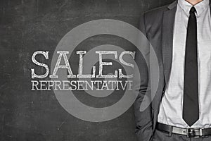 Sales representative on blackboard