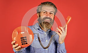 Sales script. Answering machine. Lead generation specialist. Bearded man phone conversation. Retro phone. Outdated