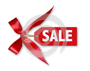 Sales Tag With Big Red Ribbon Bow Tied