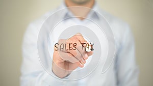 Sales Tax, Man writing on transparent screen