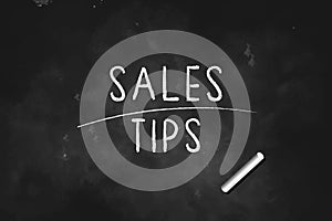 SALES TIPS written with chalk on black board icon logo design vector illustration