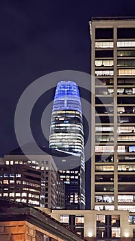 The Salesforce buildings, skyscrapers and office buildings in the city skyline at night
