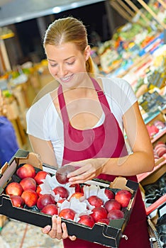 Salesgirl in supermarket