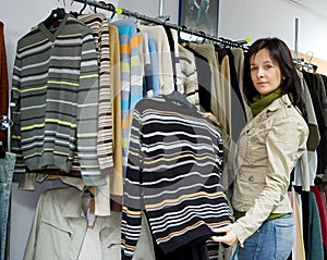 Saleslady in a jeans wear shop