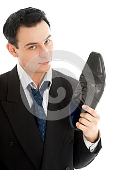 Salesman with black leather boot