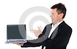 Salesman points at laptop