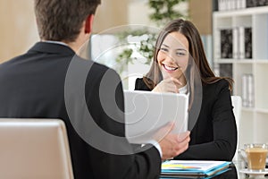 Salesman showing product to a client