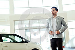 Salesperson at car dealership