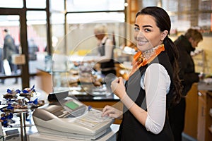 Salesperson at cash register